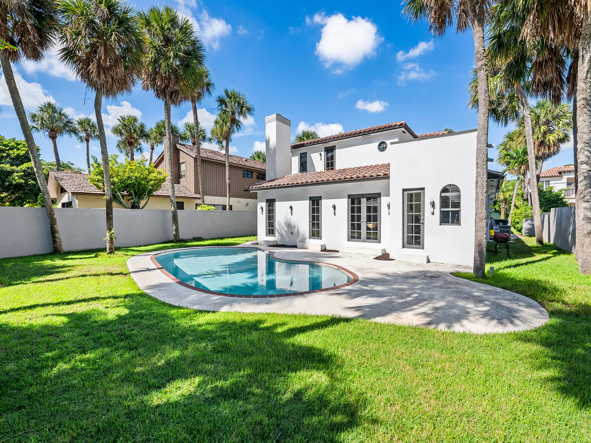 Fenced privacy, tropical landscape.... and pool!