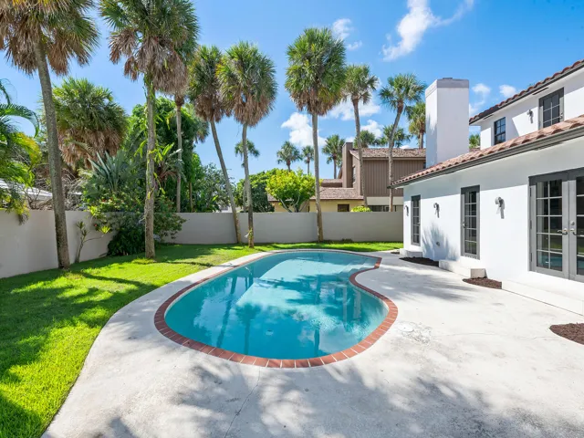 This area would potentially be a wonderful place to add your dream outdoor kitchen.