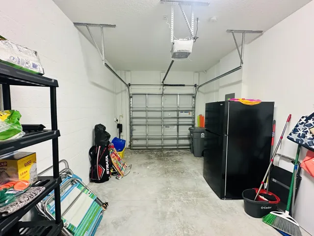 one car garage with room for parking or storage and driveway has room for 2 cars