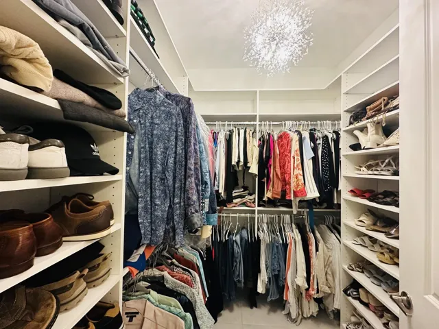 Master Bedroom with custom closet & lighting