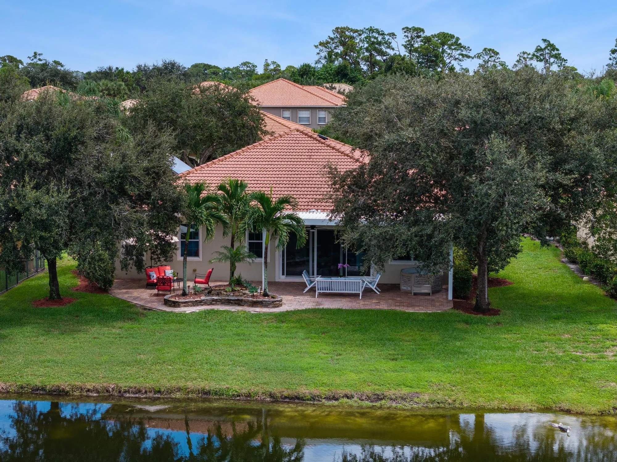 Rear Aerial with Pergola Patio Mature Landscaping and Full Lake Frontage