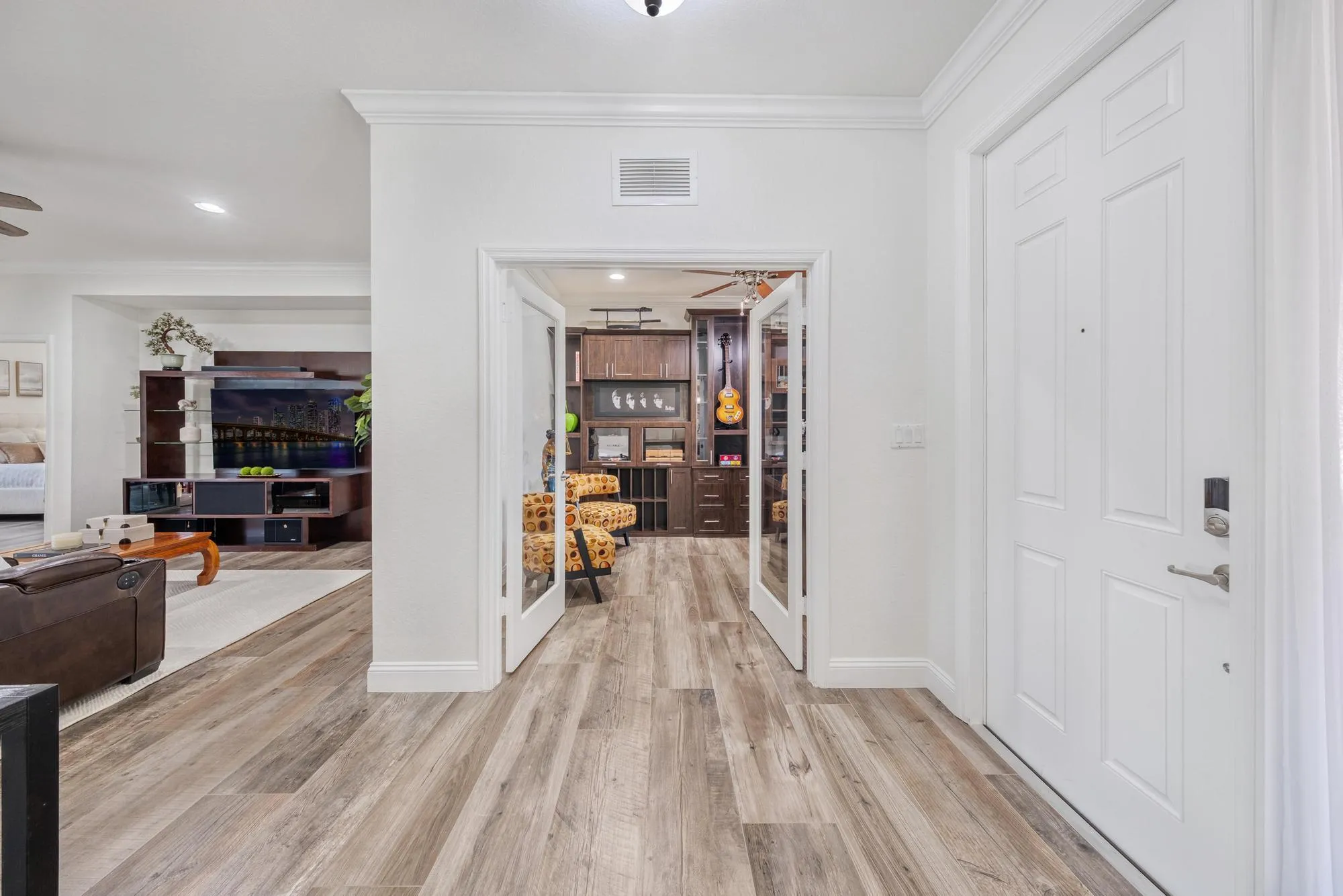 Hallway Sightline Connecting the Entry, the Family Room, Dinning Room and the Private Office