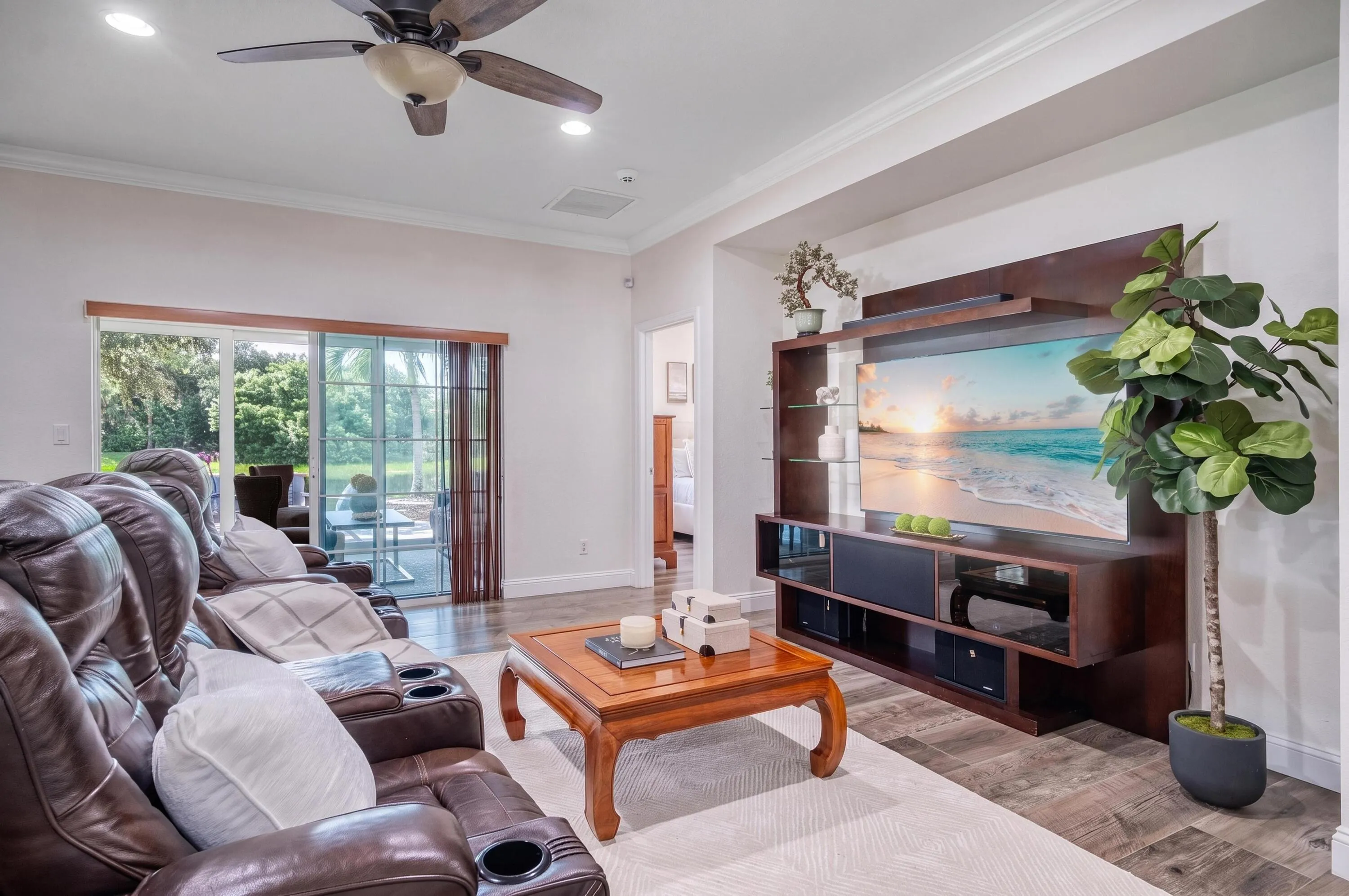 Family Room View with Opening to Sunroom and Lake