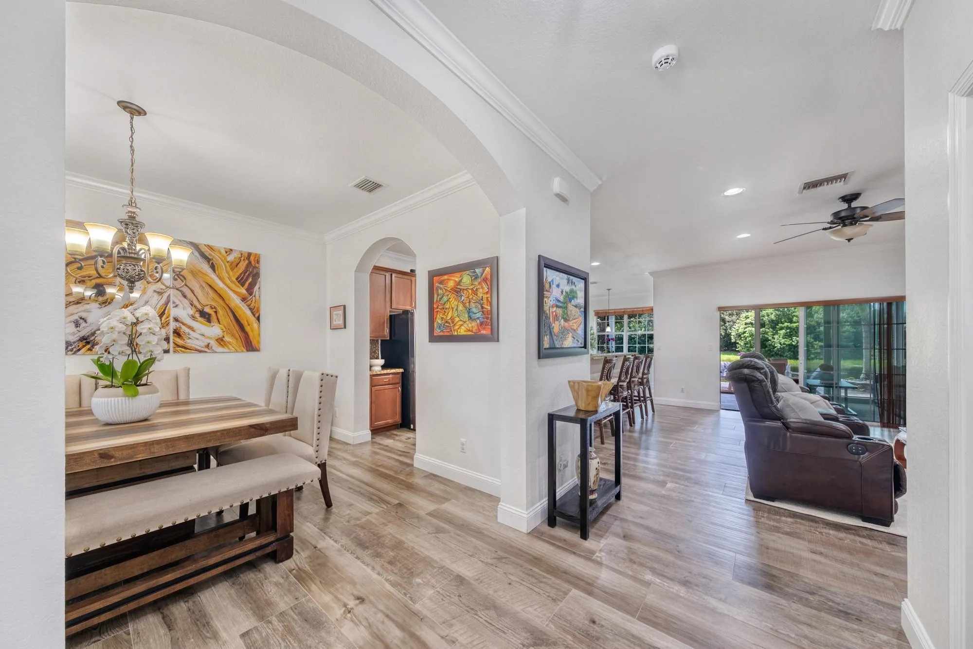Foyer View with Spanish Porcelain Tiles and Crown Molding Throughout