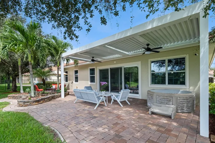 Seating Area and Jacuzzi Under Pergola