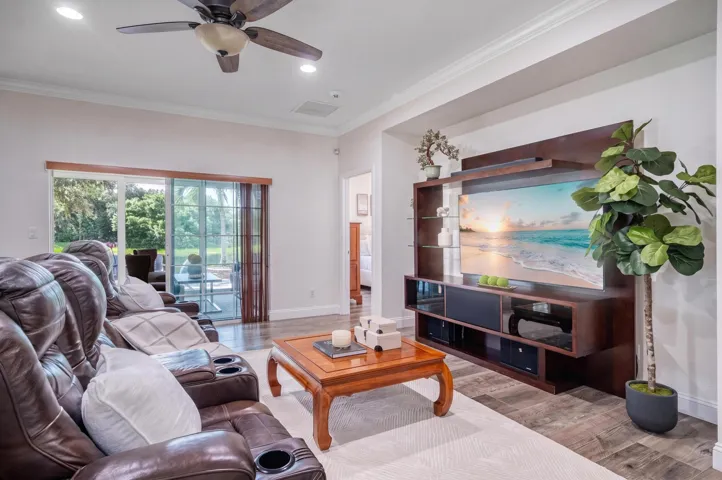 Family Room View with Opening to Sunroom and Lake
