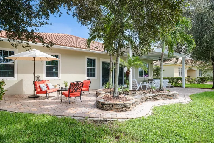 Yard with Custom Stone Garden and Paved Patio