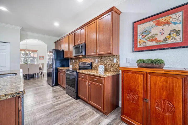 Custom Made Wood Cabinetry with Granite Countertops