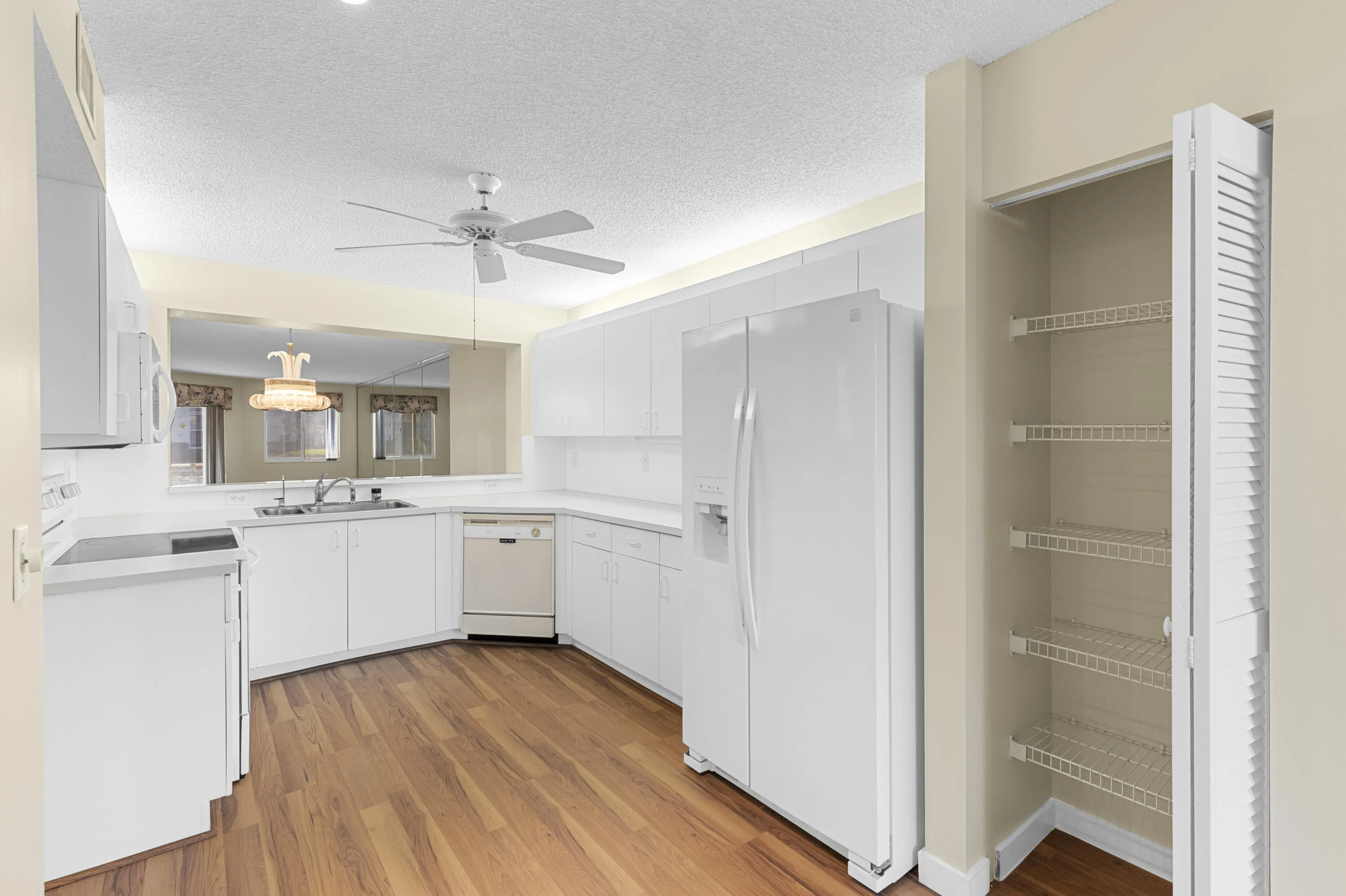 Kitchen with pass thru to Living Room