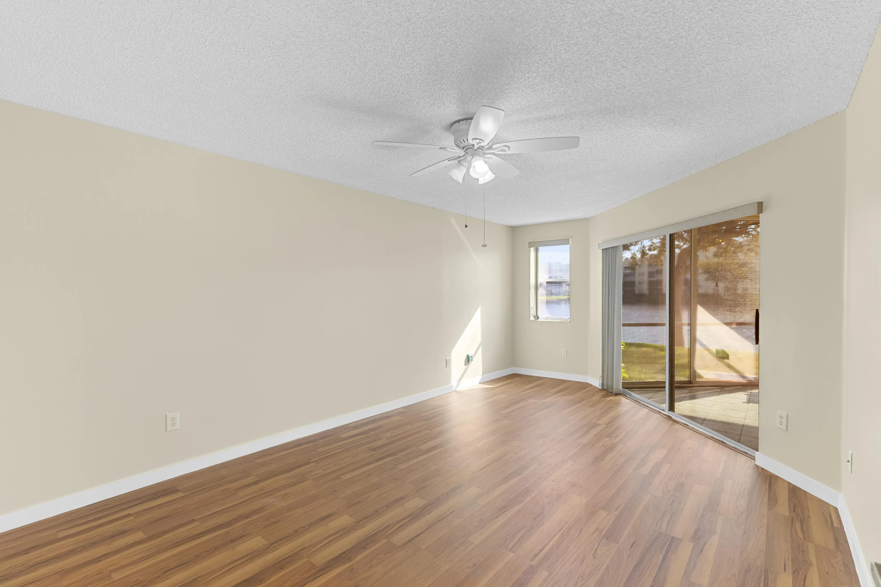 Primary Bedroom to East Waterfront Patio