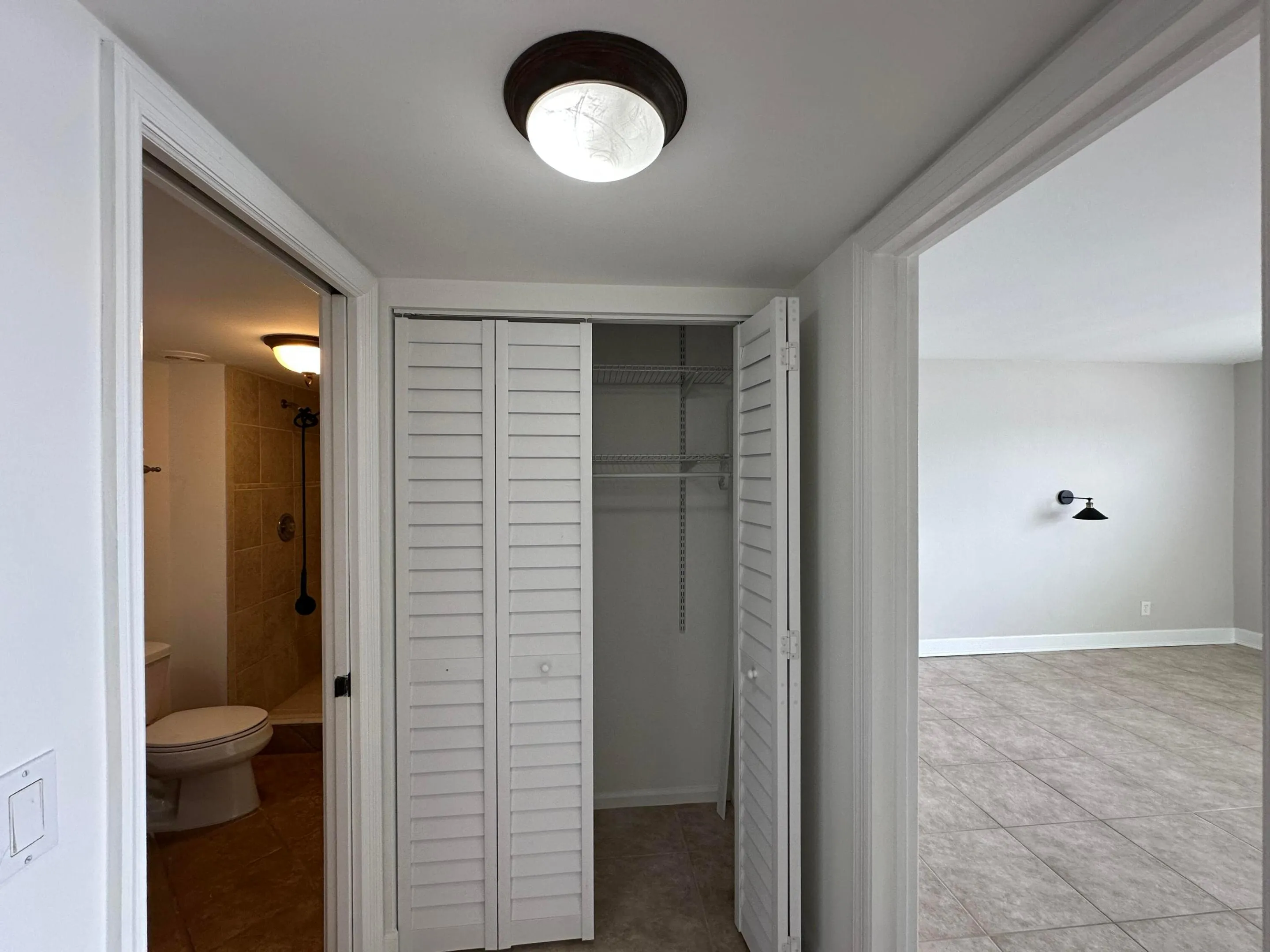 One of two spacious closets in the Primary suite with the bathroom on your left and bedroom and right