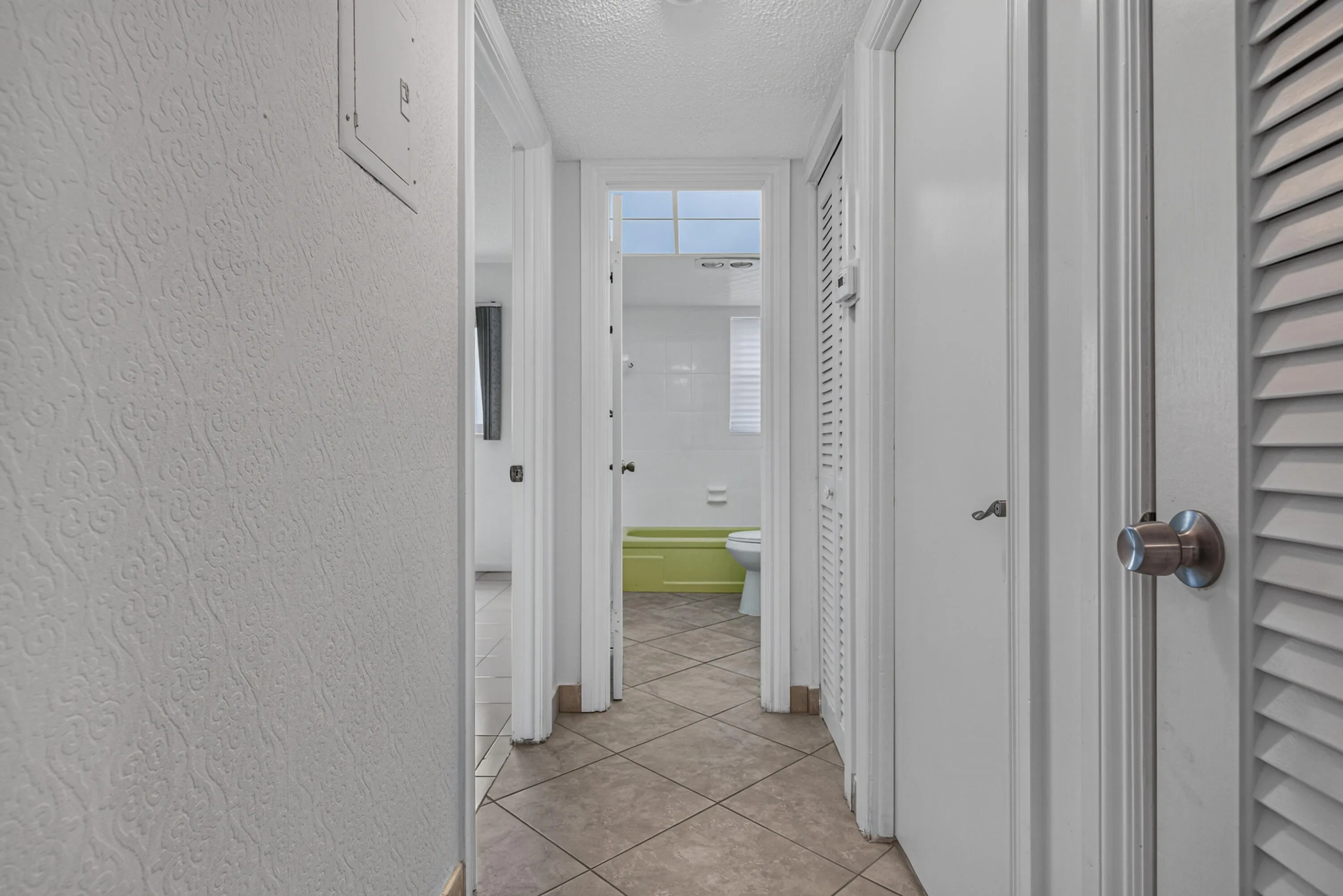 Hall way to Bedrooms and Guest Bath