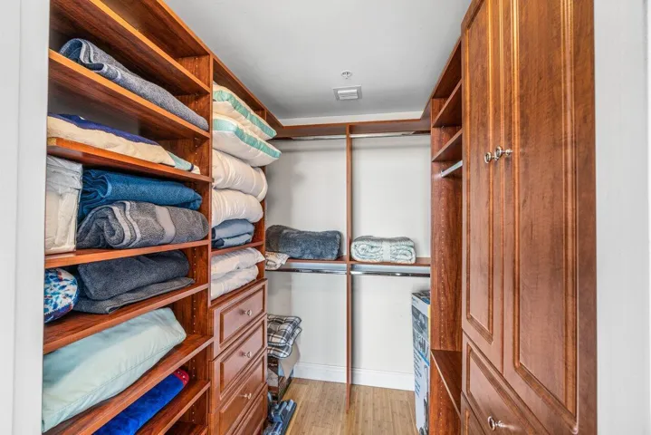 Walk-In Closet with Full Custom Shelves