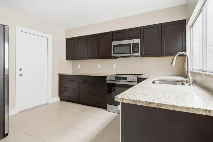581-NW-47TH-AVE-33445-016
