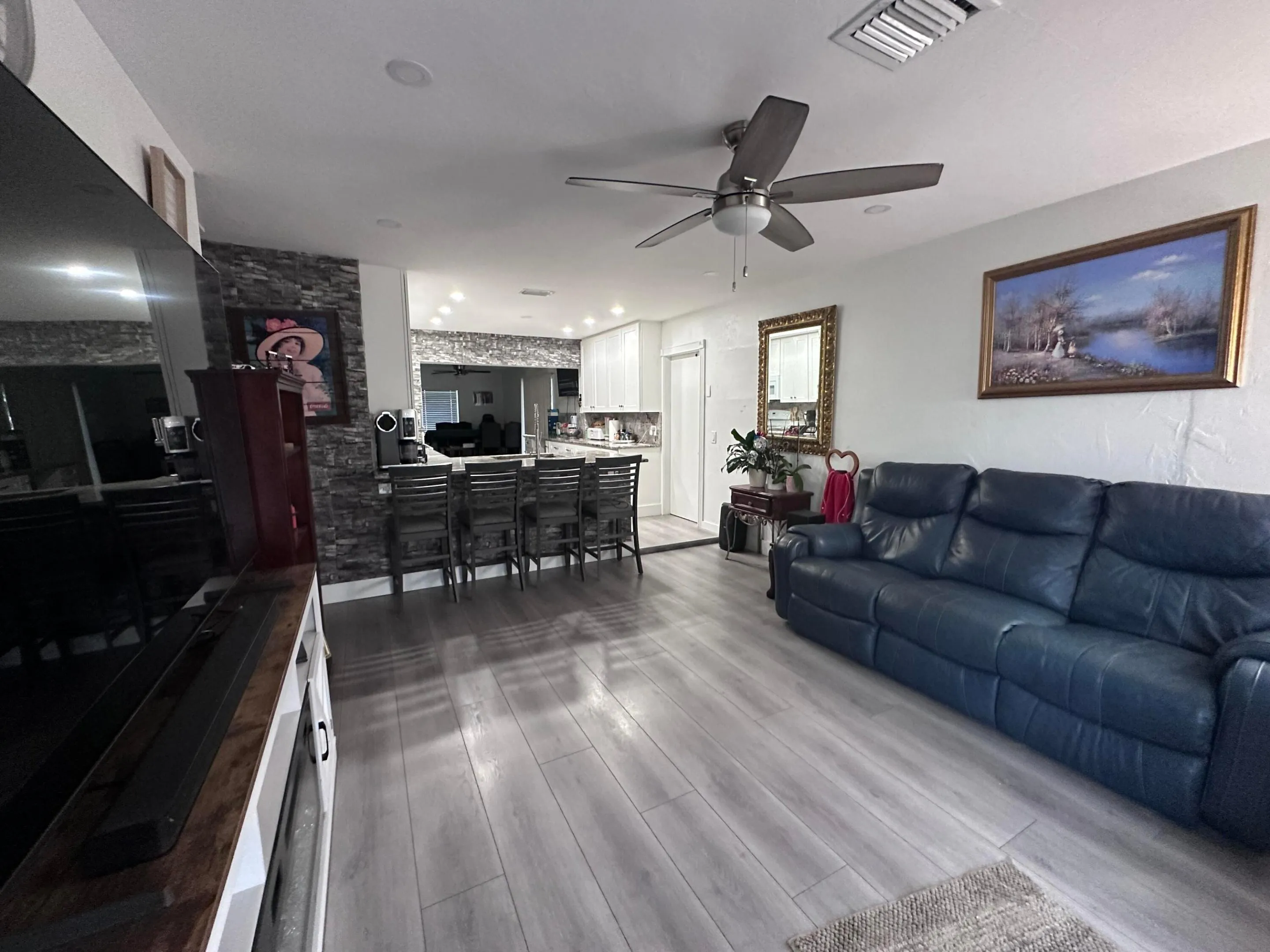 Front door enters into the Living Area of the Great Room.