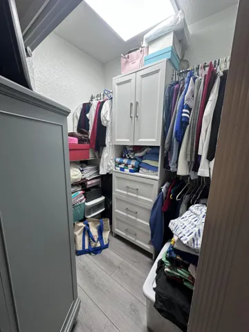 One Walk In Closet in Master Bedroom with LED lighting.