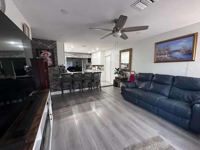 Front door enters into the Living Area of the Great Room.