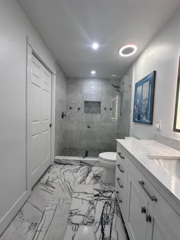 Master Bath fully renovated, marble floors, walk in shower