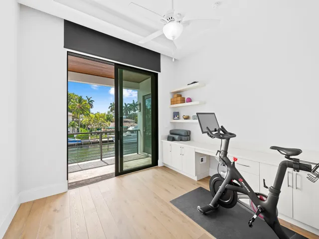 Bedroom or gym, another spacious room with plenty of natural light. Electric blinds