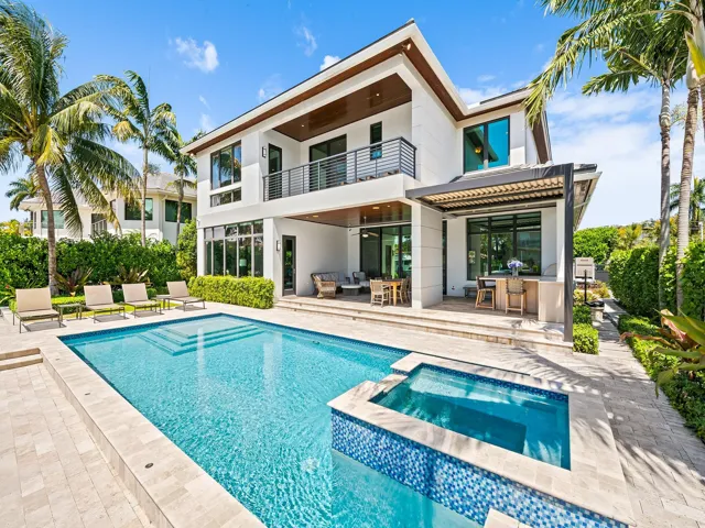 An exquisite modern residence where striking architecture, sophisticated design, and waterfront living come together beautifully.