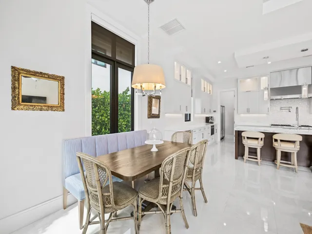 The casual dining area offers a relaxed and inviting space, perfect for everyday meal and family gatherings