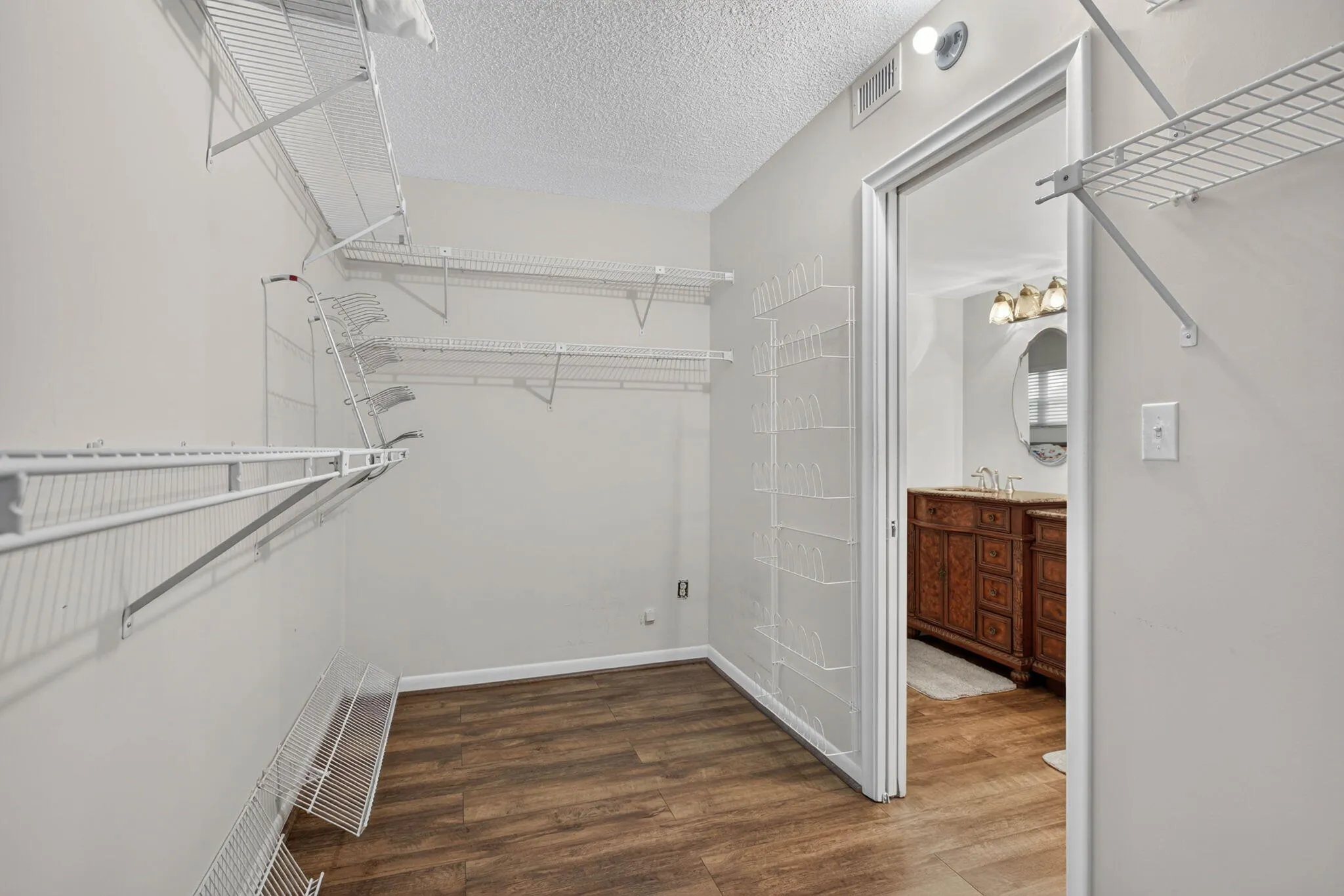 MAIN BEDROOM WALK IN CLOSET