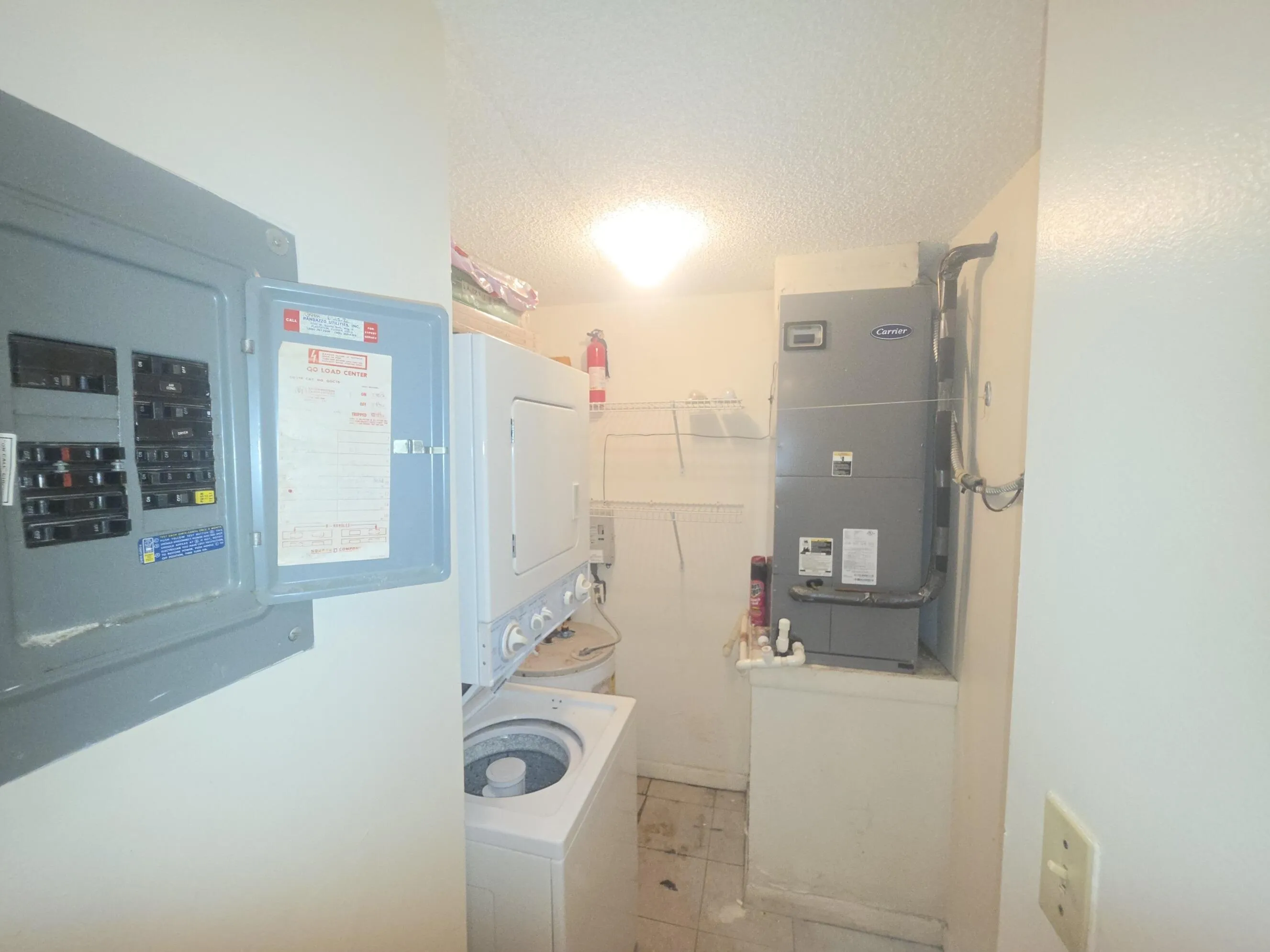 CLOSET LAUNDRY AC ELEC PANEL AND WATERTA