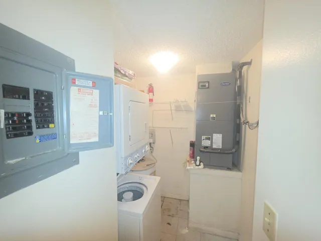 CLOSET LAUNDRY AC ELEC PANEL AND WATERTA