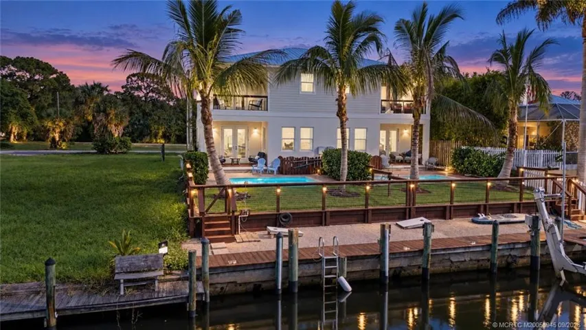 Canal, Dock, and Back Yard Views