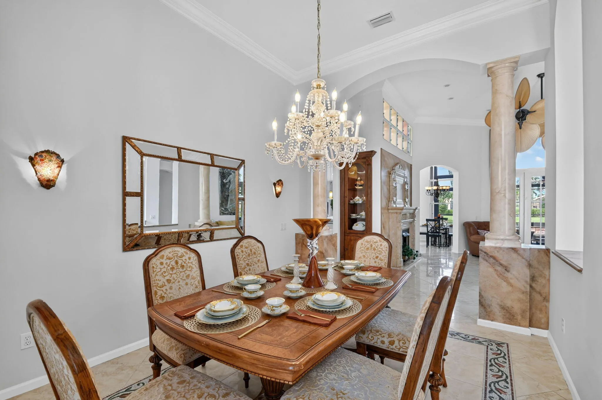 The Mosaic tile inlay elegantly frames the dining area adding a distinctive touch of artistry & sophistication around the dining table.