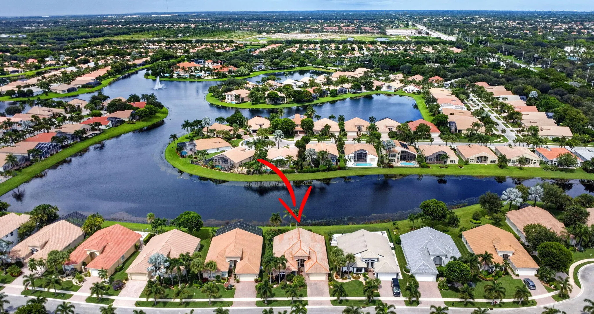 Expansive Lakes Surround This Exceptional Waterfront Home