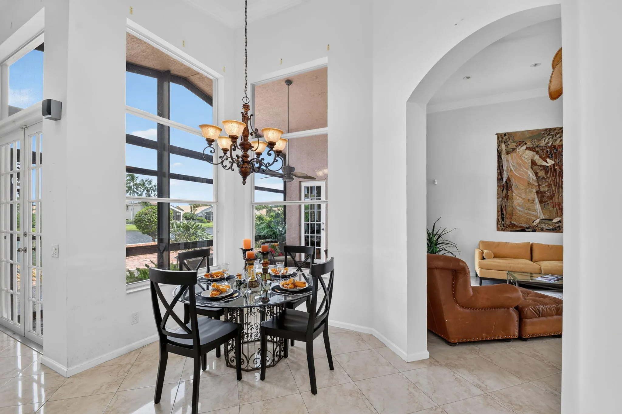 Two lovely tall windows overlooking the water, bringing beautiful views and light