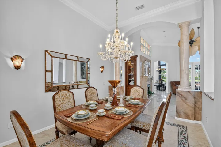 The Mosaic tile inlay elegantly frames the dining area adding a distinctive touch of artistry & sophistication around the dining table.