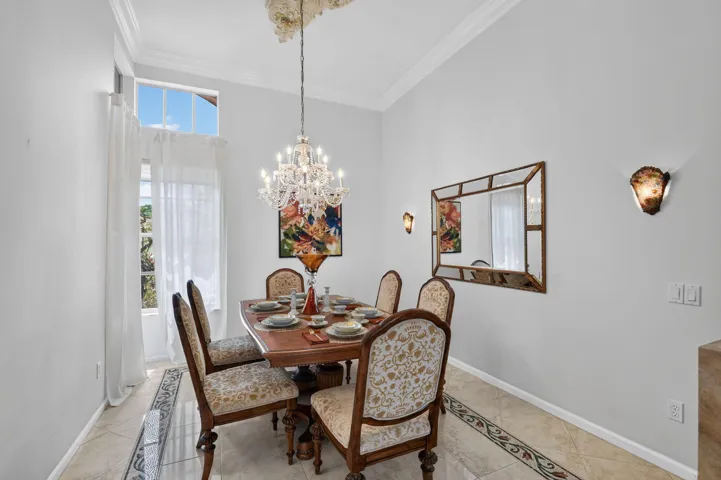 soaring 12' ceiling, graceful arches and beautiful transom windows that bring in abundance of light.