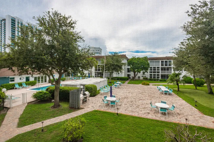 View of the courtyard from thr screened balcony.