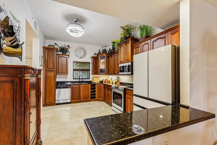 7-web-or-mls-Presidential Way #310-S1809