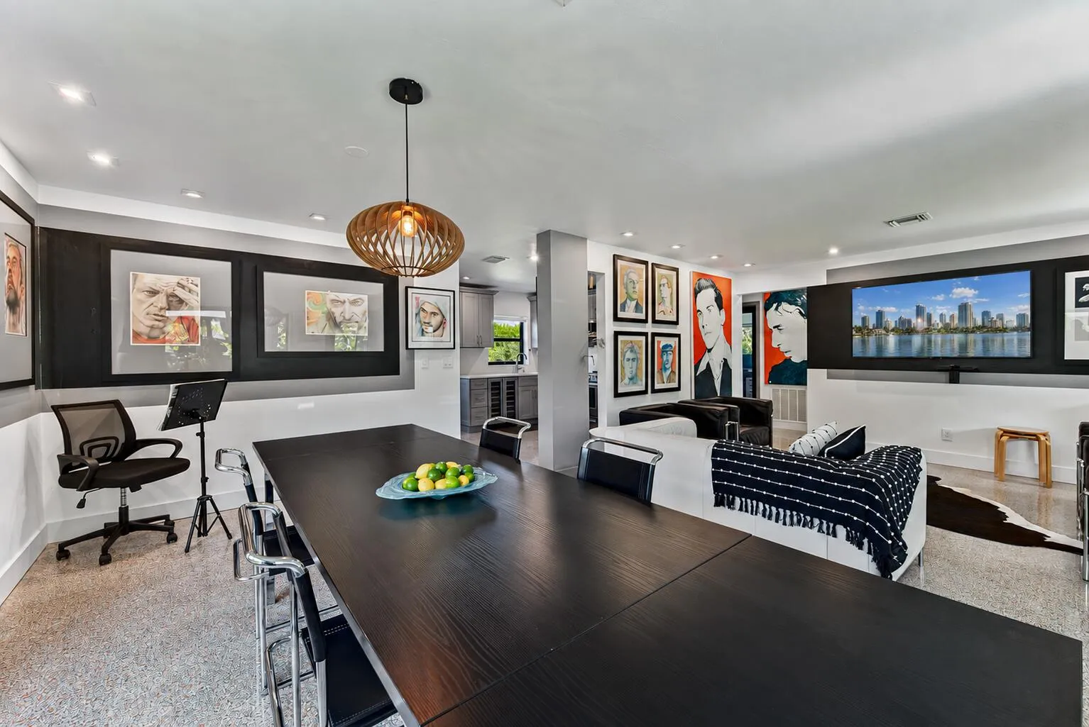 Spacious living area, with expasive windows and extensive wall space for your art.