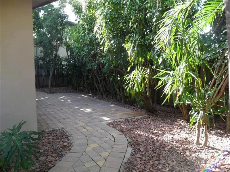 Wrap around patio covers entire back half of property.
