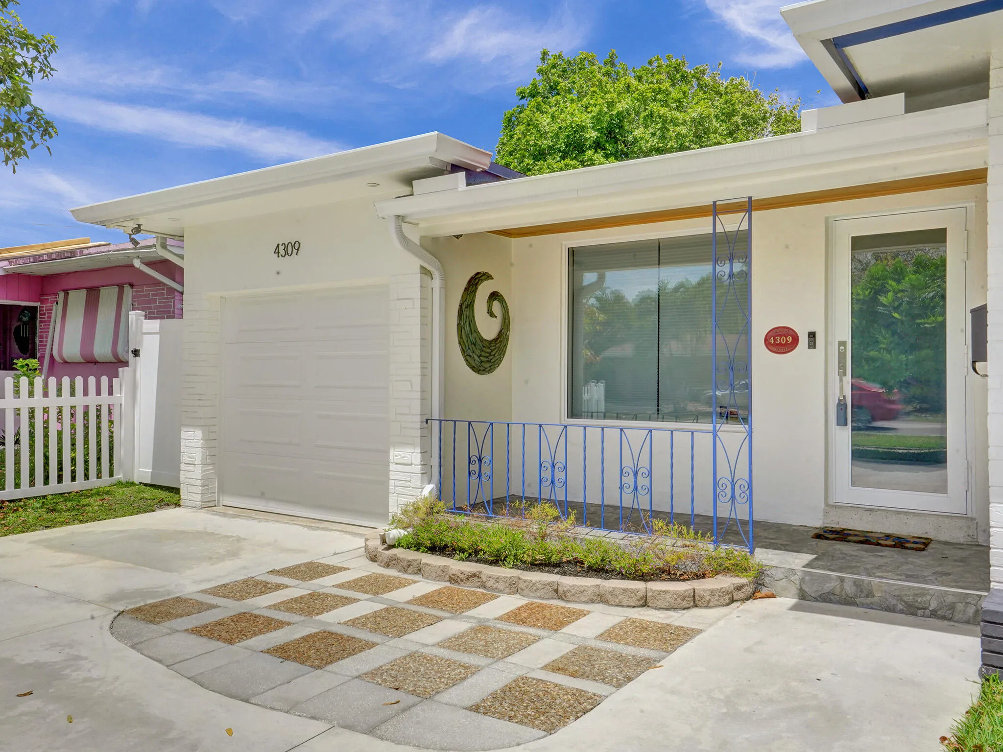 Enjoy your morning coffee on the front porch while overlooking your garden area.
