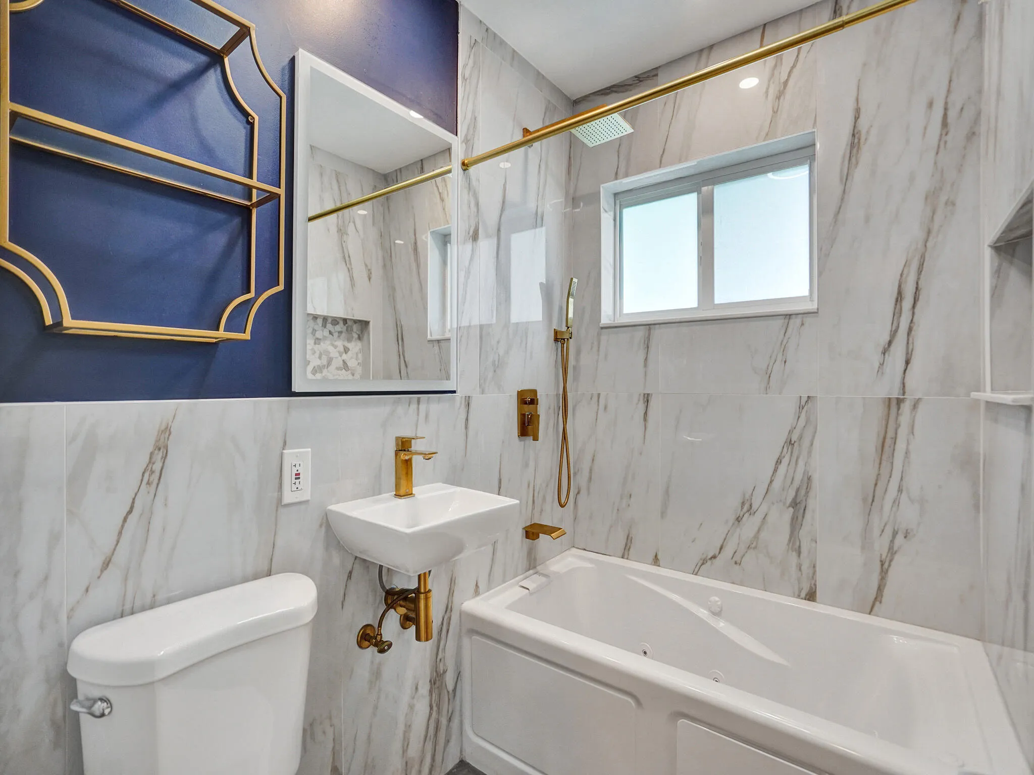 Luxurious updated bathroom with spa tub