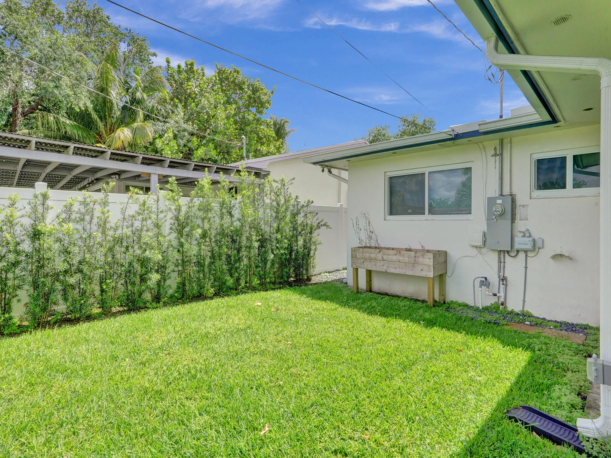 private lawn & gardening area off the rear patio