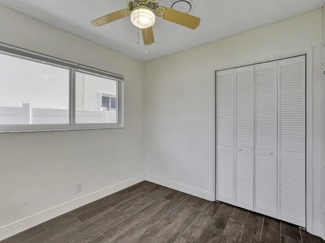 Perfect Guest room or Den/Office space with plenty of easily accessible storage cabinets.