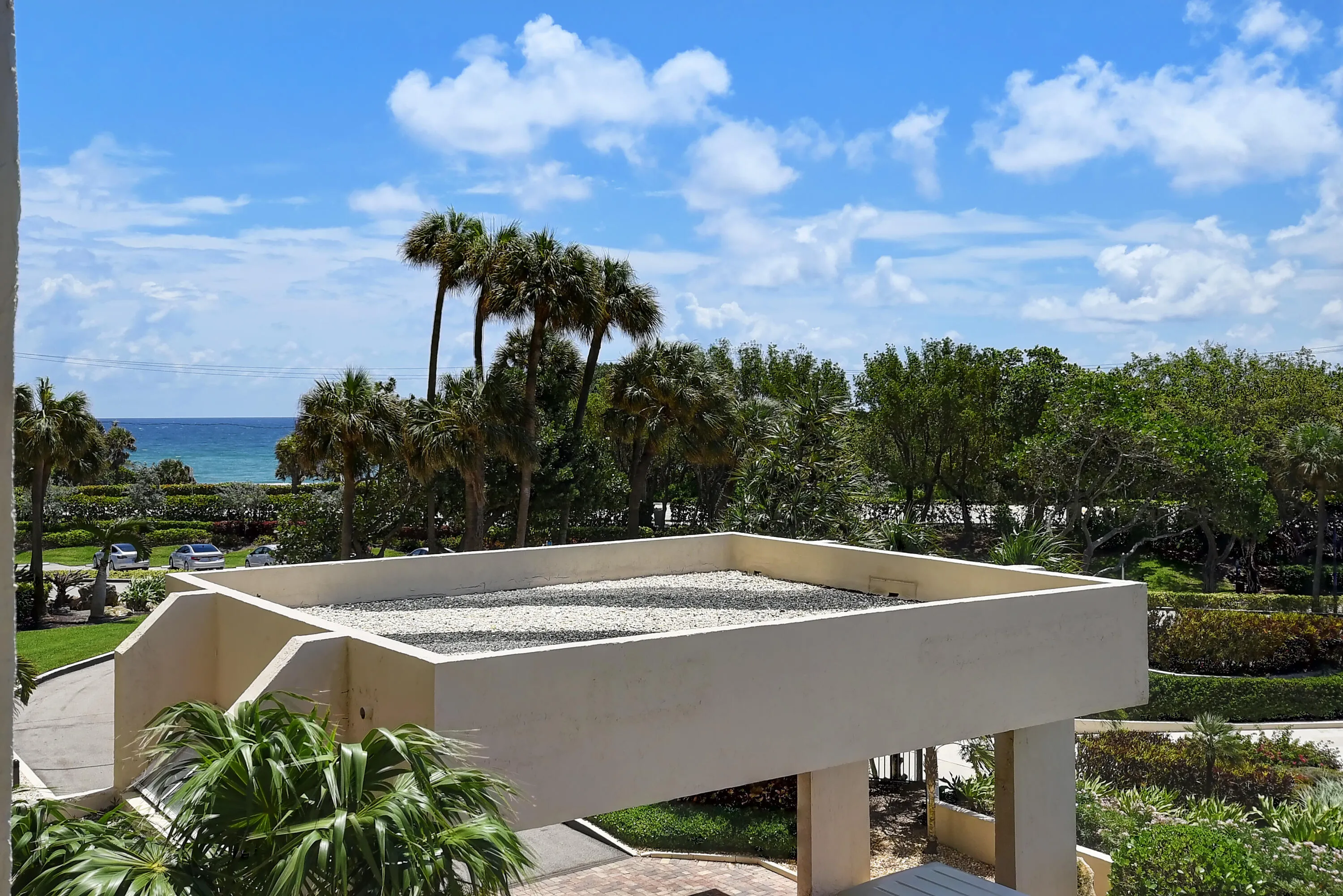 PARTIAL OCEAN VIEW TO THE EAST LUSH GARDEN VIEWS WHEN LOOKING STRAIGHT FROM BALCONY