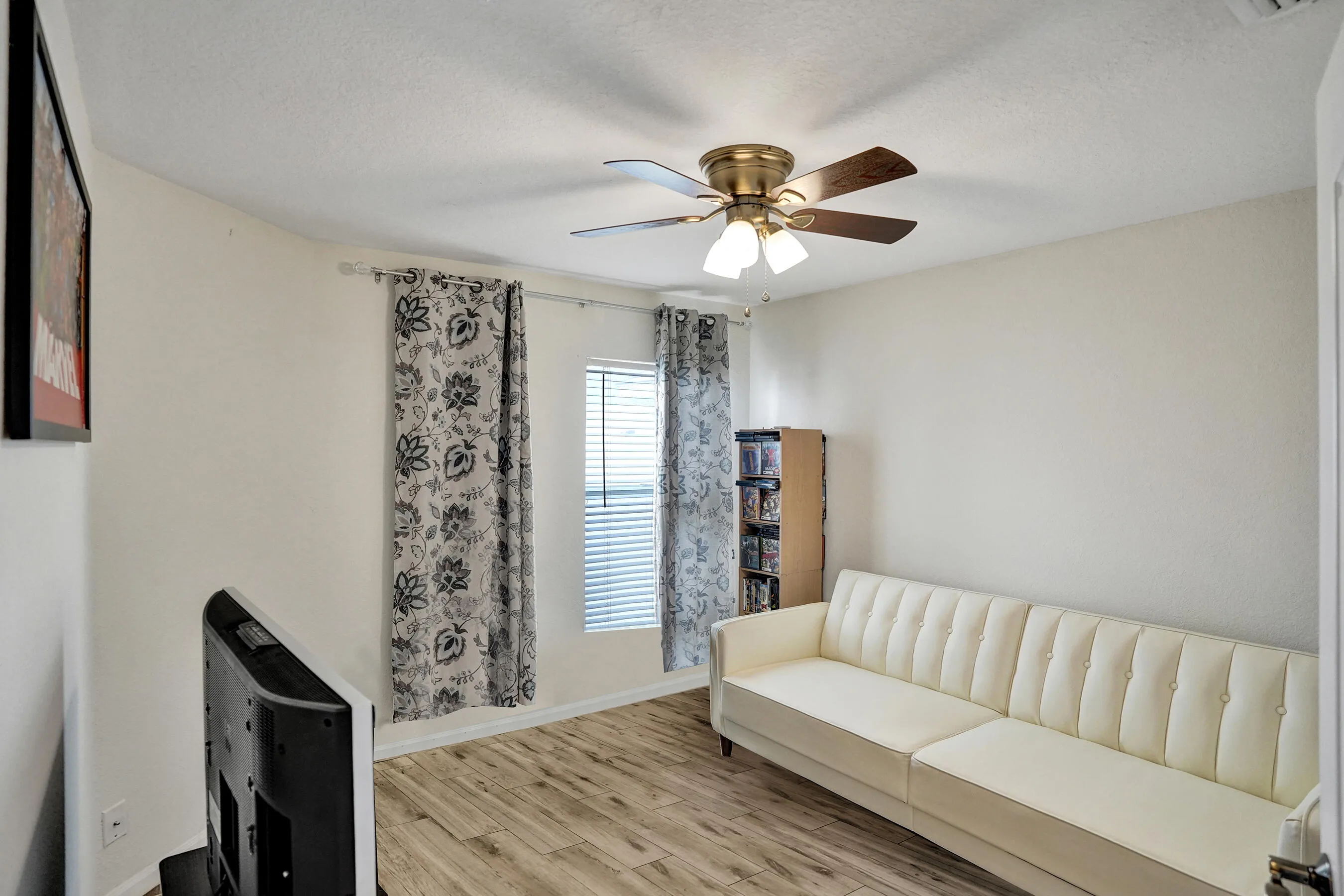 Bedroom 2: Bright secondary bedroom offering flexible space for guests, family or a home office.