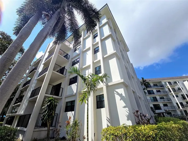 New balcony railings and New, modern paint scheme and landscaping