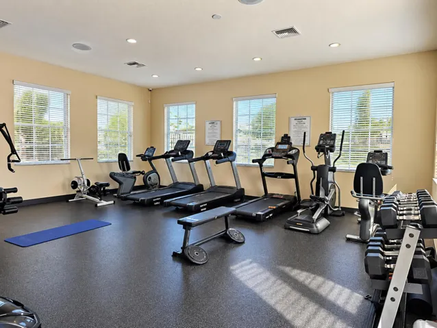 Community fitness center with cardio and strength equipment.