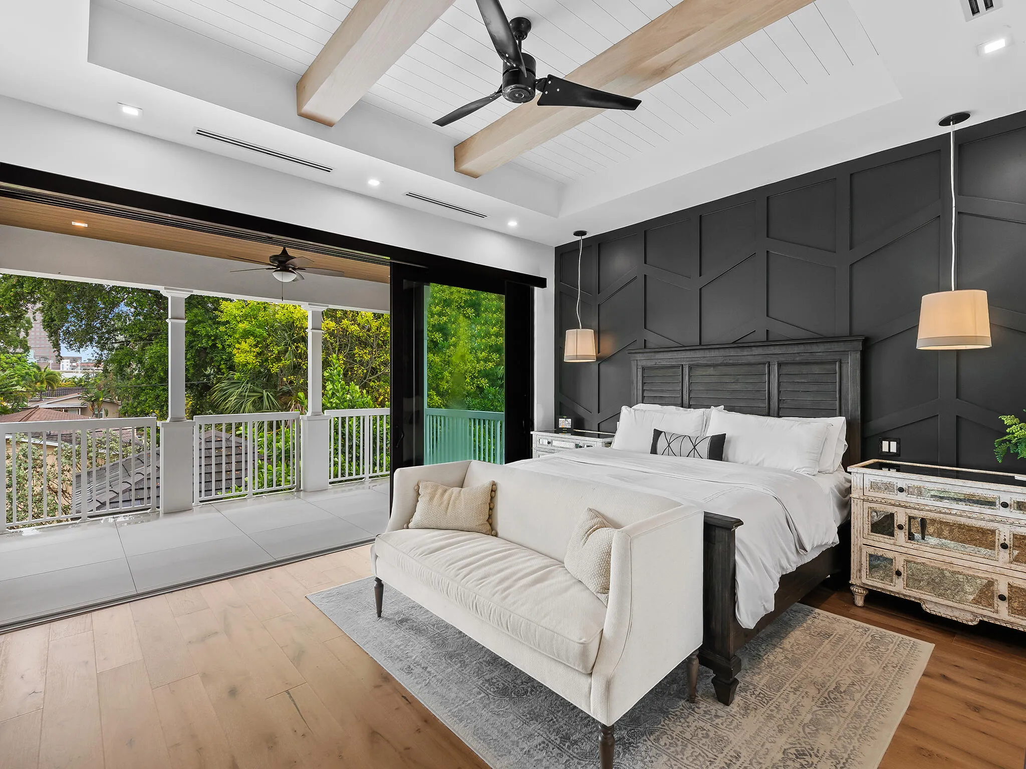 Dining nook with round table and black-framed windows