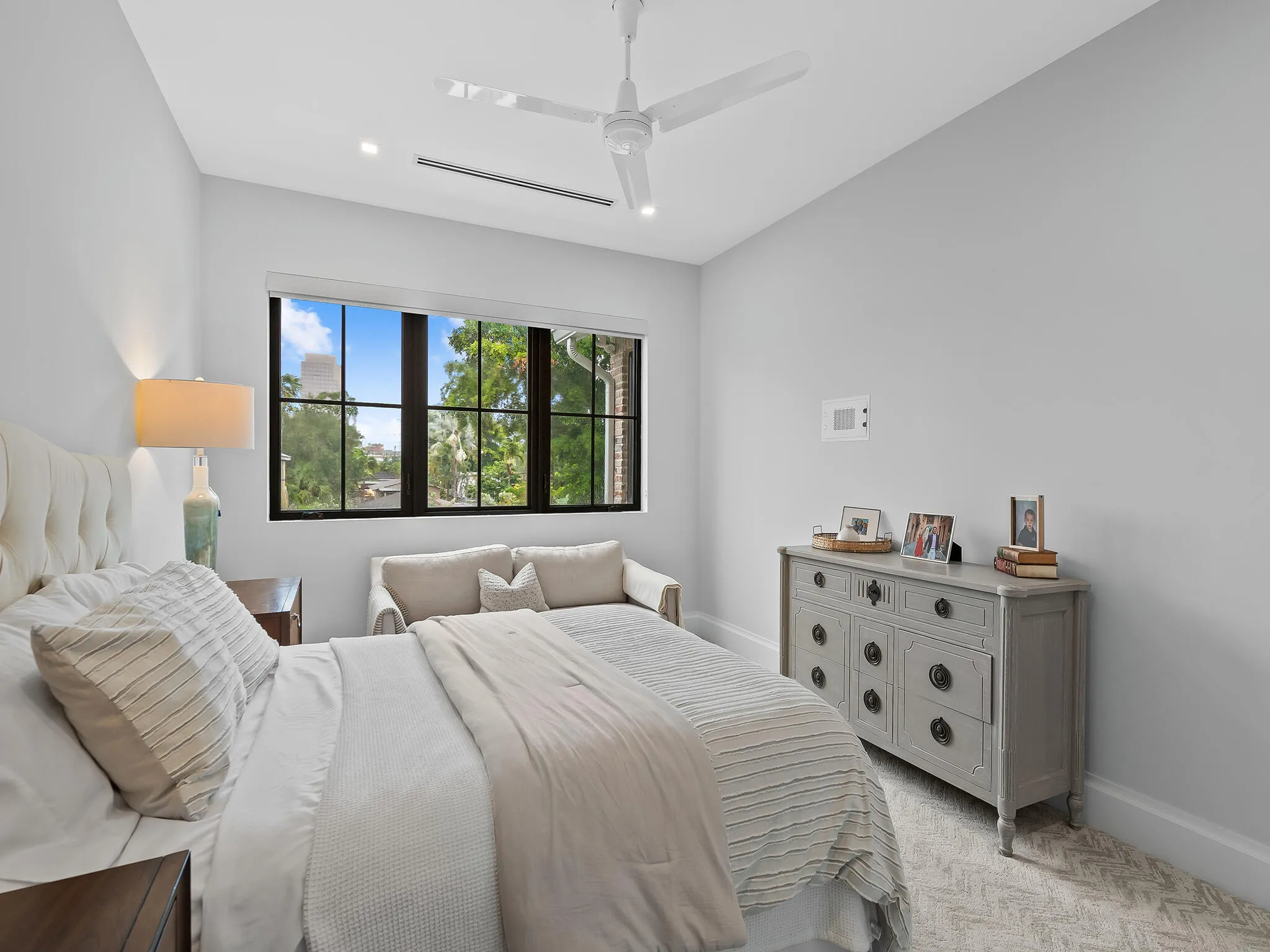 Great room with fireplace open to the entry
