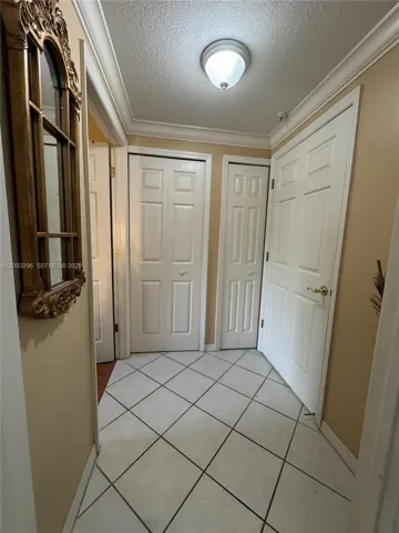 Hallway to bedroom, bathroom and in-unit washer dryer