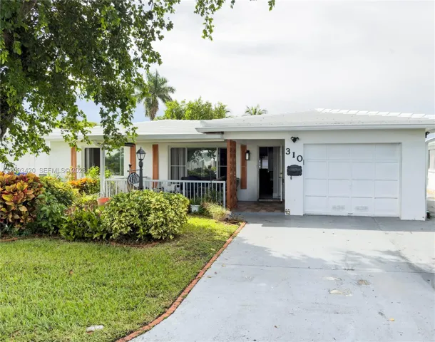 310 NW 25th Ct